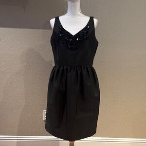Elegant Black Sleeveless Dress with Sequin Detail